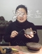 紫砂壶工艺师图片:何觅 - 宜兴紫砂壶网