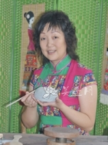 紫砂壶工艺师图片：周古梅 - 宜兴紫砂壶网