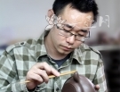 紫砂壶工艺师图片：万亚健 - 宜兴紫砂壶网