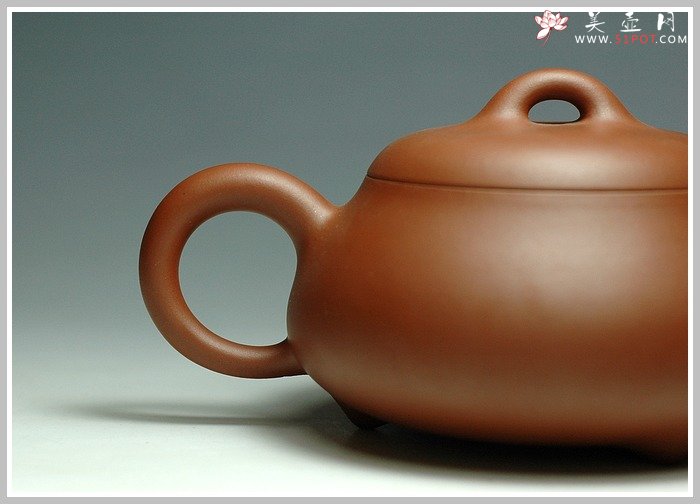 紫砂壶图片：全手之三弯石瓢 - 宜兴紫砂壶网