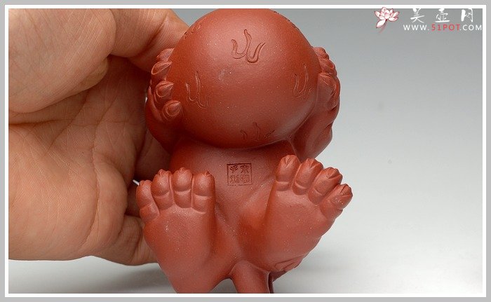 紫砂壶图片：一对送福的小狮子 - 宜兴紫砂壶网