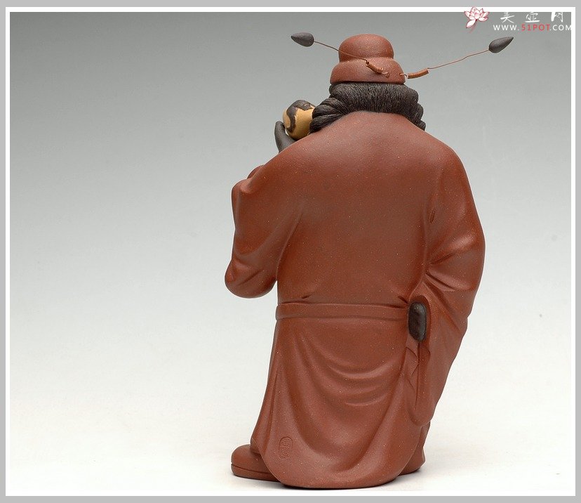 紫砂壶图片：钟馗引福 - 宜兴紫砂壶网