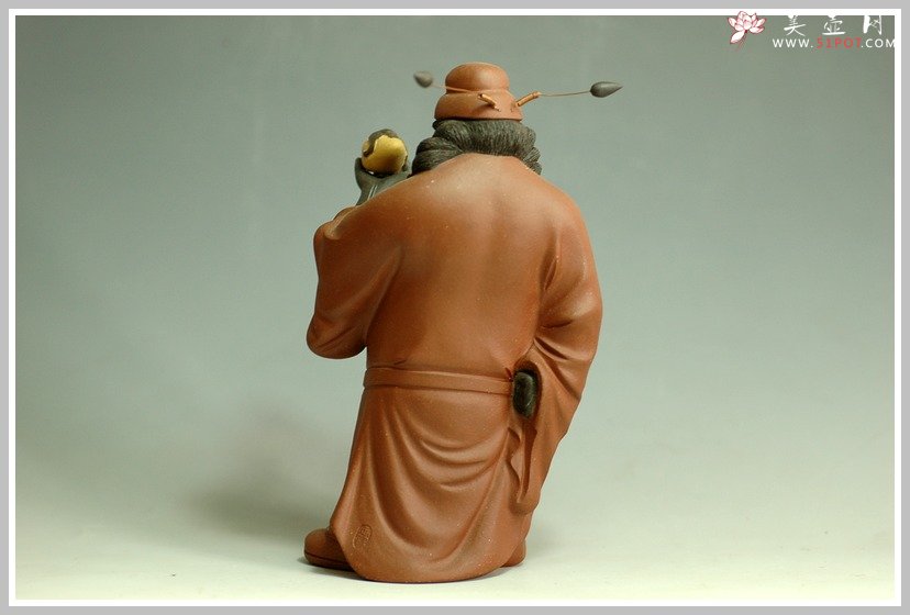 紫砂壶图片：钟馗引福 - 宜兴紫砂壶网