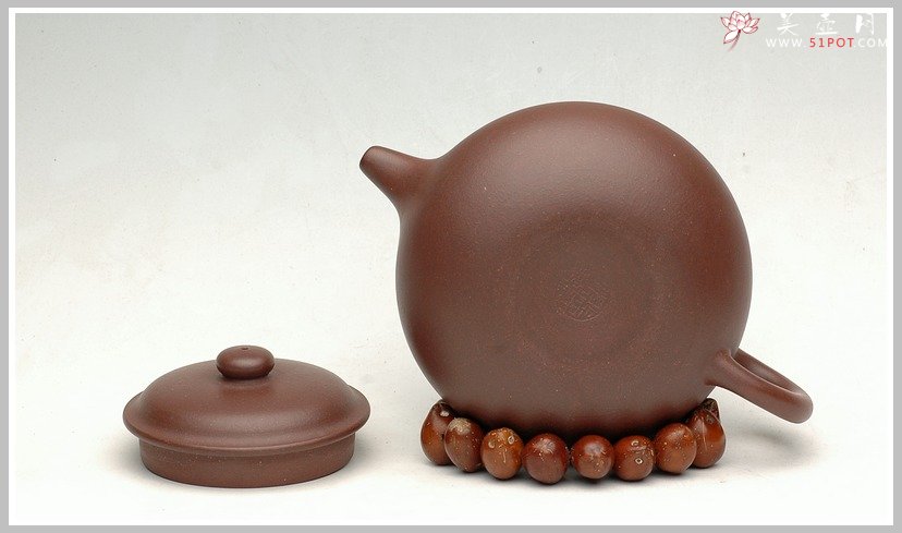 紫砂壶图片：全手一捺底刹瓦成型之仿古 - 宜兴紫砂壶网