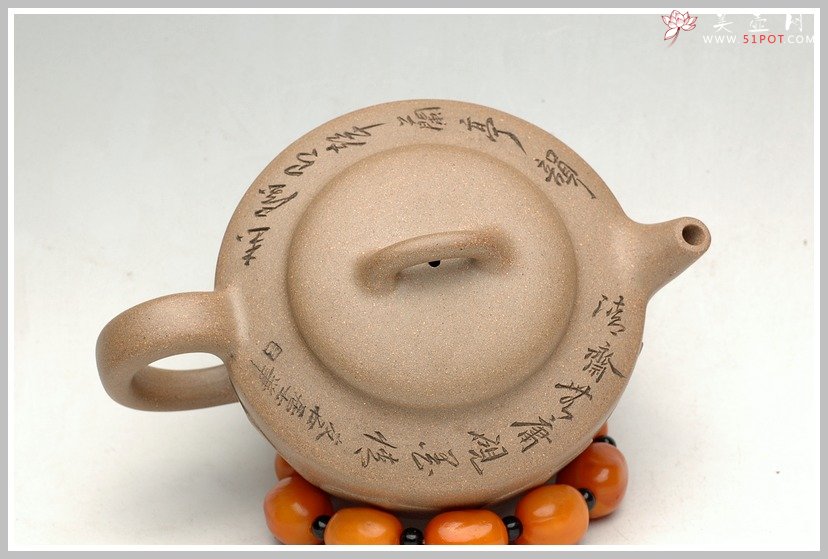 紫砂壶图片：婉约厚韵之莲影 - 宜兴紫砂壶网