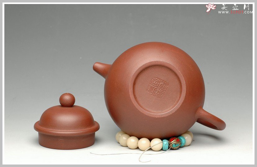 紫砂壶图片：鱼乐之掇球 - 宜兴紫砂壶网