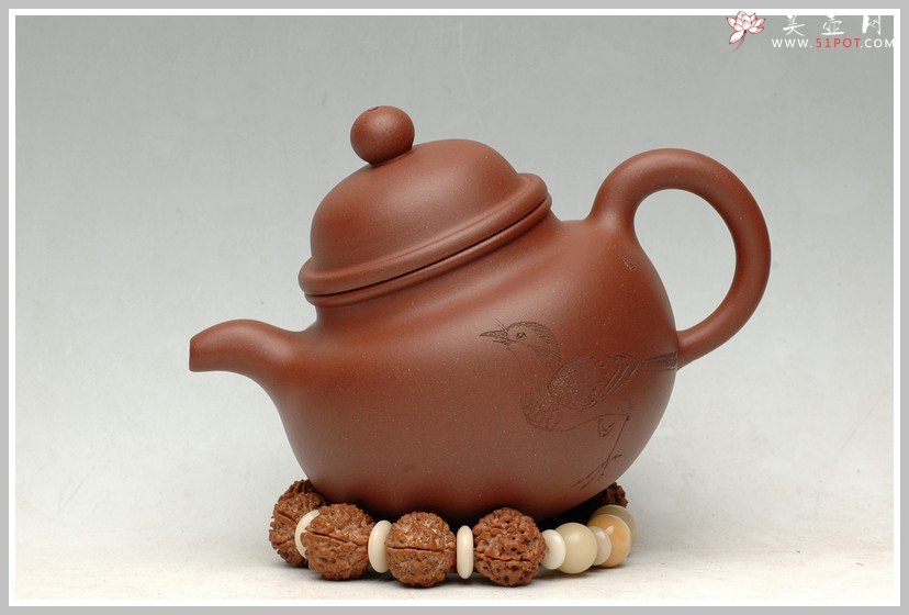 紫砂壶图片：传统实用之掇球 - 宜兴紫砂壶网