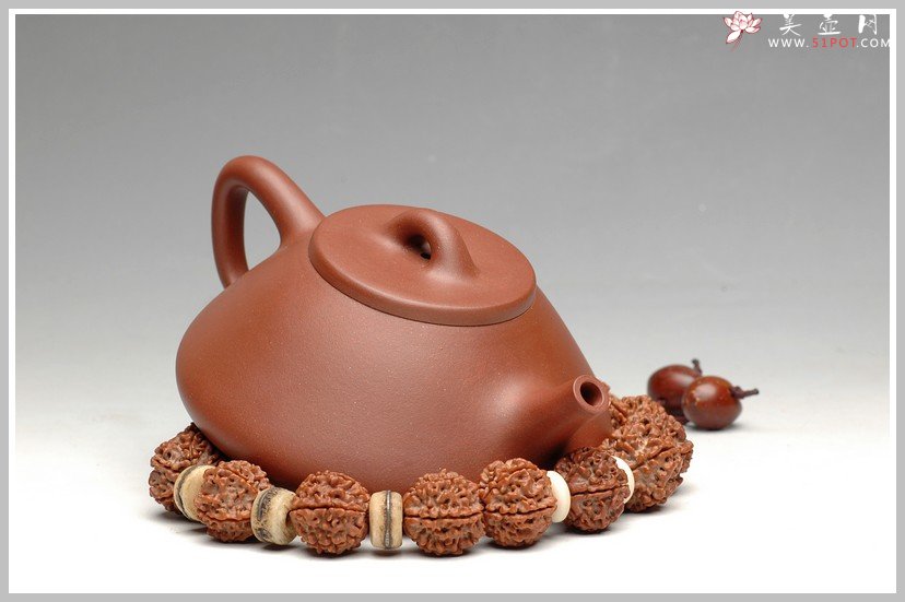 紫砂壶图片：传统耐品之全手石瓢 - 宜兴紫砂壶网