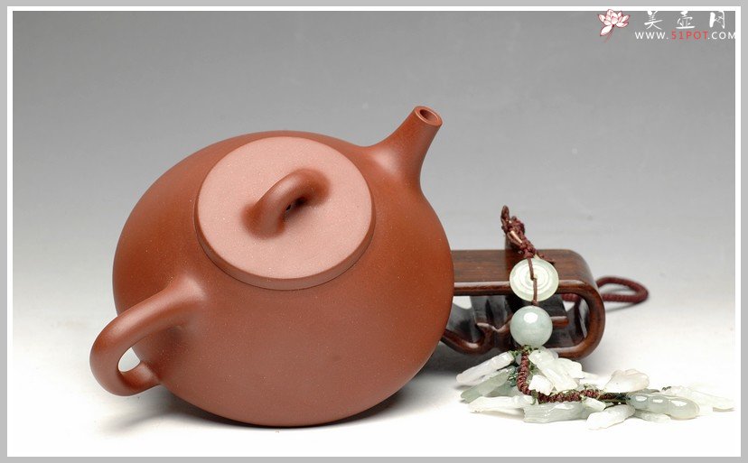 紫砂壶图片：传统耐品之全手石瓢 - 宜兴紫砂壶网