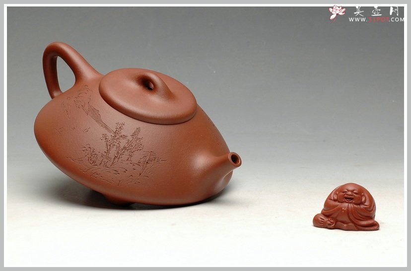 紫砂壶图片：流行派  可爱又不失瓢骨 扁石瓢 - 宜兴紫砂壶网
