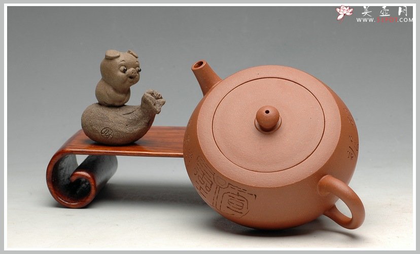 紫砂壶图片：简练古拙 杀茶利器  全手折肩巨轮 - 宜兴紫砂壶网