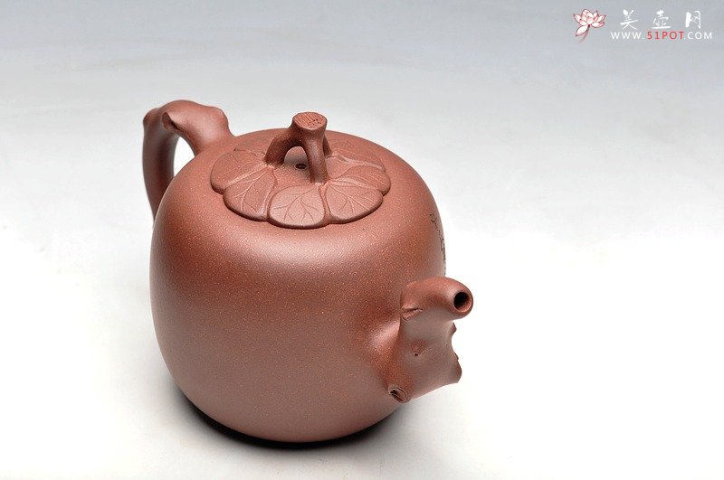 紫砂壶图片：老味具显 造型大方简练  贴叶自然生动 木瓜 - 宜兴紫砂壶网