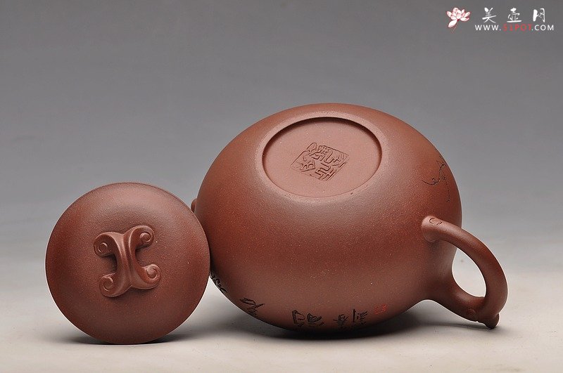 紫砂壶图片：饱满敦厚  口盖严合 如意桥韵 - 宜兴紫砂壶网