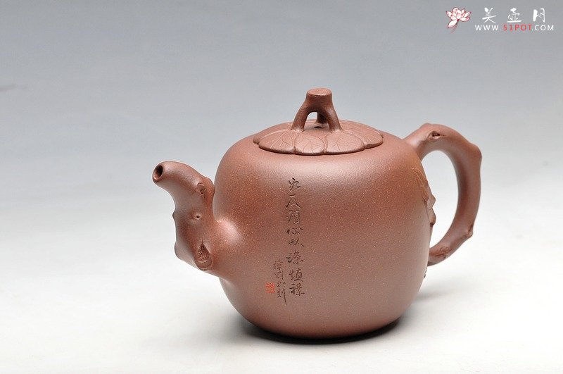 紫砂壶图片：老味具显 造型大方简练  贴叶自然生动 木瓜 - 宜兴紫砂壶网