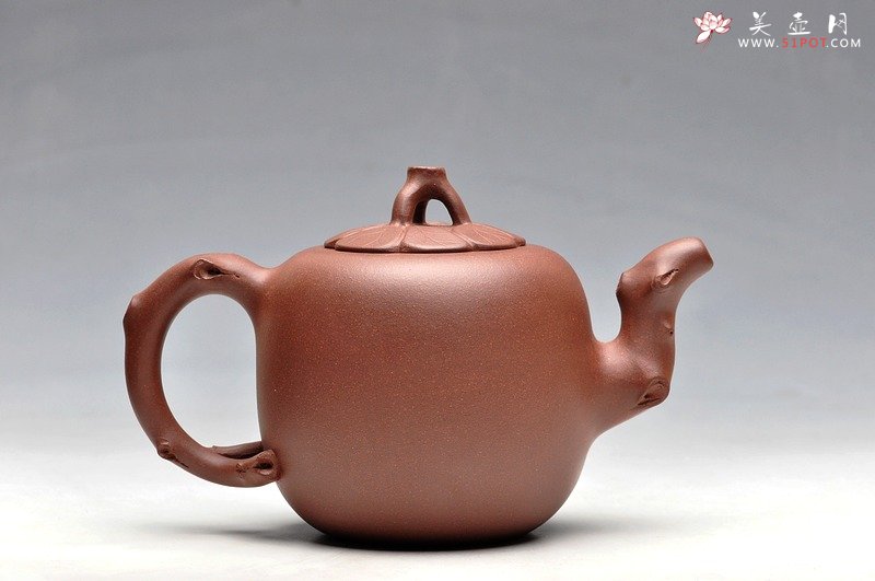 紫砂壶图片：老味具显 造型大方简练  贴叶自然生动 木瓜 - 宜兴紫砂壶网