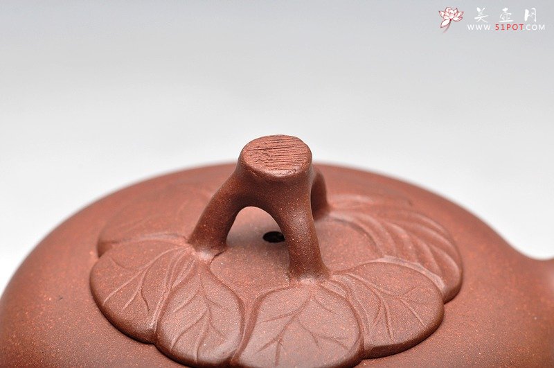 紫砂壶图片：老味具显 造型大方简练  贴叶自然生动 木瓜 - 宜兴紫砂壶网