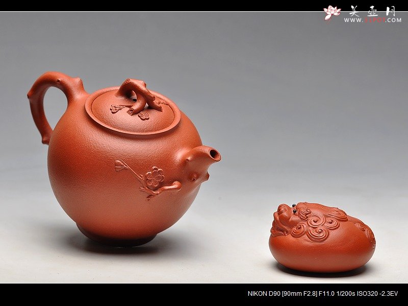 紫砂壶图片：饱满可爱 亭亭玉立 精品梅花 红梅圆珠 - 宜兴紫砂壶网