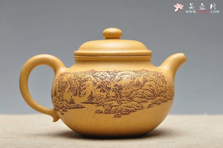 紫砂壶图片：古朴经典 儒雅得体 通景山水 莲子 - 宜兴紫砂壶网