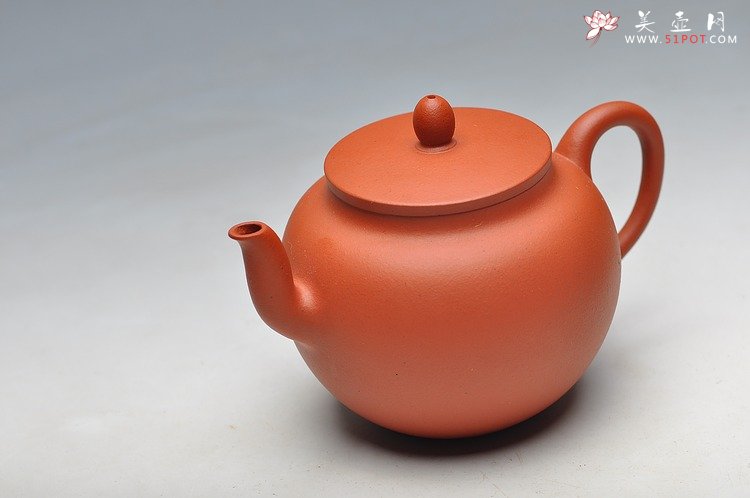 紫砂壶图片：线条流畅 挺拔优雅 全手红泥迎春 静如处子 - 宜兴紫砂壶网