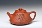 紫砂壶图片：骨肉均挺 全手降坡泥小子冶石瓢 李彦雄装饰 - 宜兴紫砂壶网