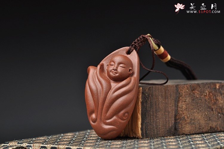 紫砂壶图片：紫砂精品手把件 传神 - 宜兴紫砂壶网