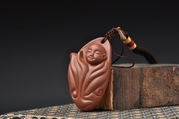 紫砂壶图片：紫砂精品手把件 传神 - 宜兴紫砂壶网