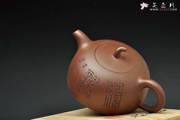 紫砂壶图片：简洁大方 圆润古朴 放生图 全手半瓜  - 宜兴紫砂壶网