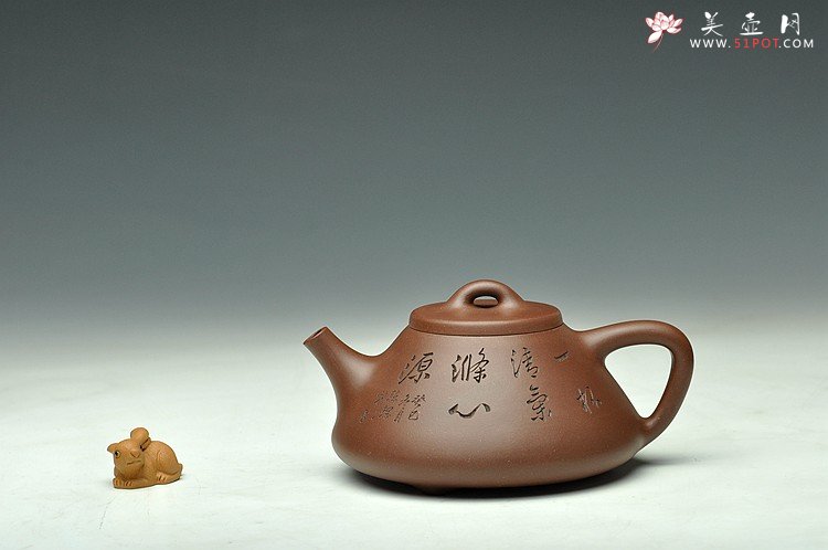 紫砂壶图片：骨肉均挺 进步明显 全手子冶石瓢 张听刚装饰 - 宜兴紫砂壶网