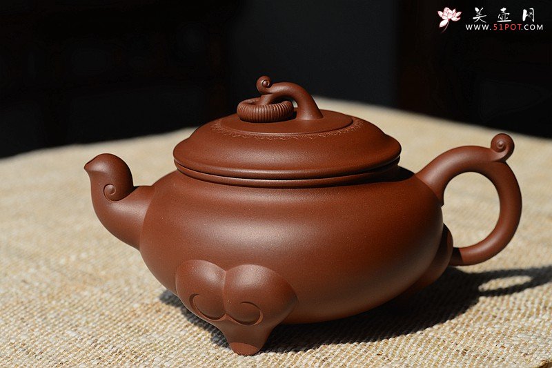 紫砂壶图片：沉稳大气 精美之作 动感十足  吉祥如意 - 宜兴紫砂壶网