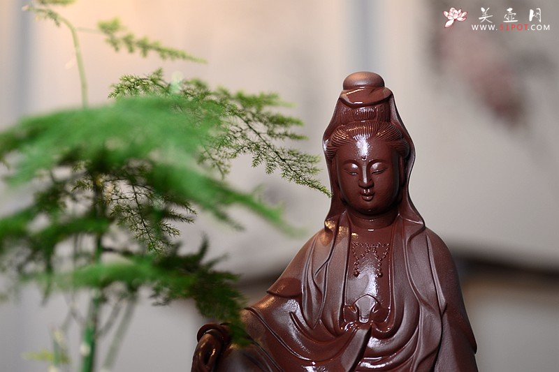 紫砂壶图片：坐观音 表情生动 整体协调 - 宜兴紫砂壶网