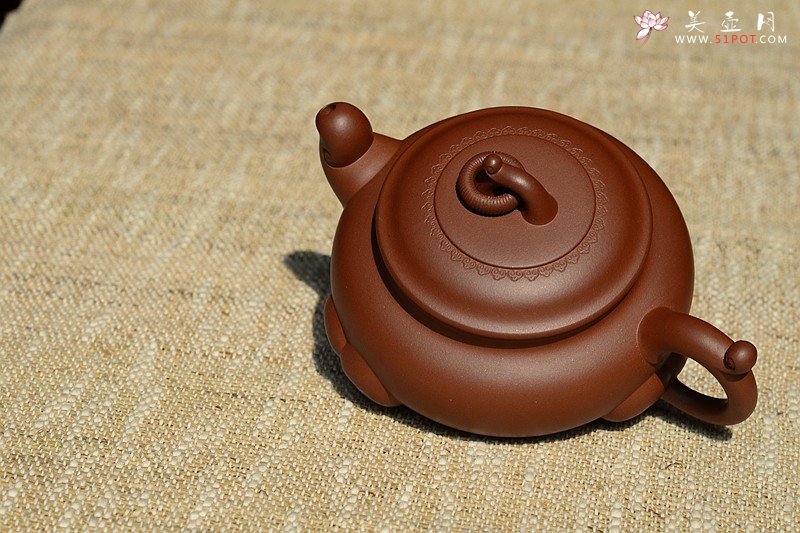 紫砂壶图片：沉稳大气 精美之作 动感十足  吉祥如意 - 宜兴紫砂壶网