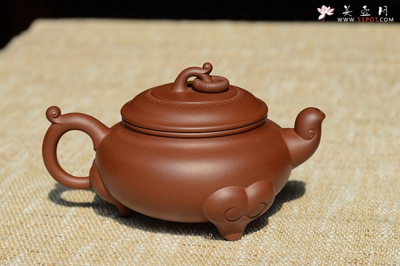 紫砂壶图片：沉稳大气 精美之作 动感十足  吉祥如意 - 宜兴紫砂壶网