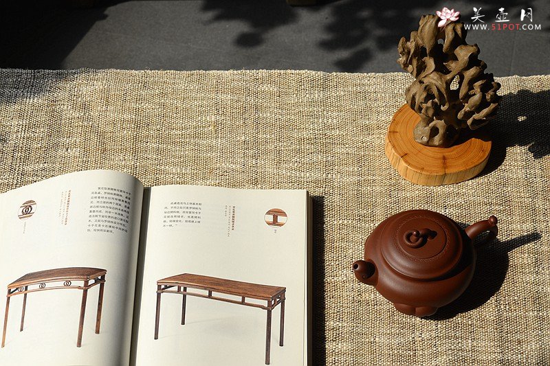 紫砂壶图片：沉稳大气 精美之作 动感十足  吉祥如意 - 宜兴紫砂壶网