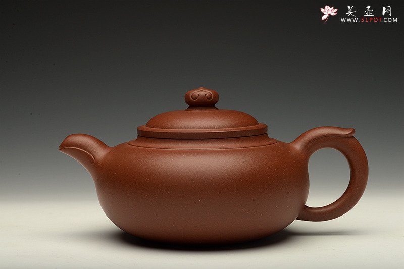 紫砂壶图片：精工实力派储俊伟代表作 厚雅飘逸  全手处处如意 - 宜兴紫砂壶网
