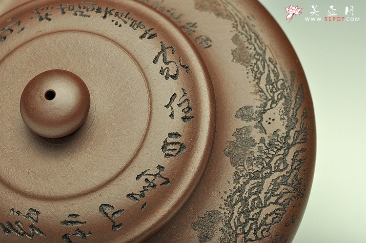 紫砂壶图片：虚扁 - 宜兴紫砂壶网