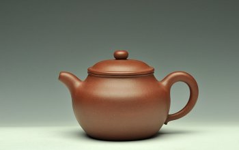 紫砂壶图片：敦厚耐品  古朴典雅  全手莲子 - 宜兴紫砂壶网