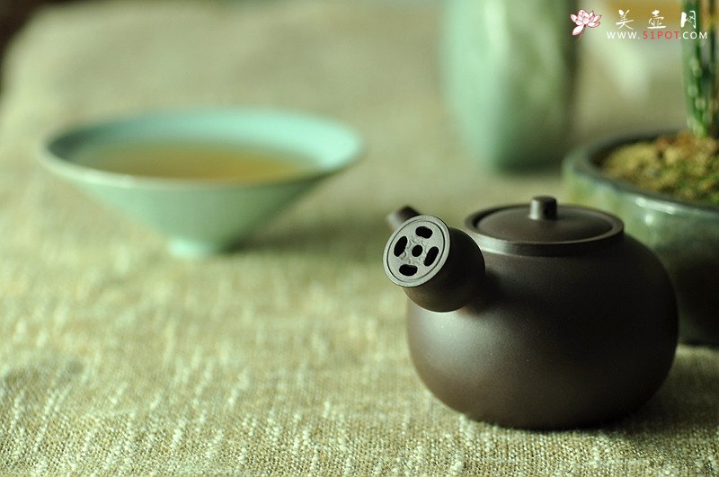 紫砂壶图片：金钱镂空~ 煮茶品茗 侧把巨轮 夏日风情~  电陶炉烧水 - 宜兴紫砂壶网