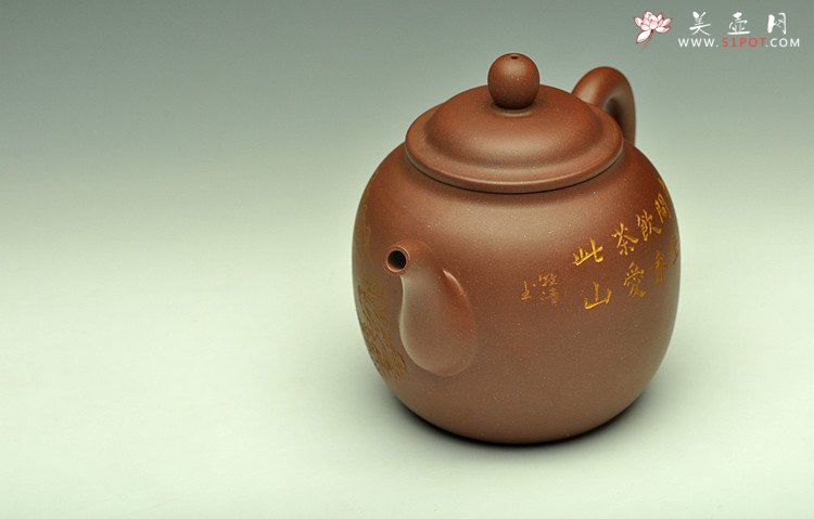 紫砂壶图片：造型简洁大方  刻绘生动逼真  全手明泉  - 宜兴紫砂壶网