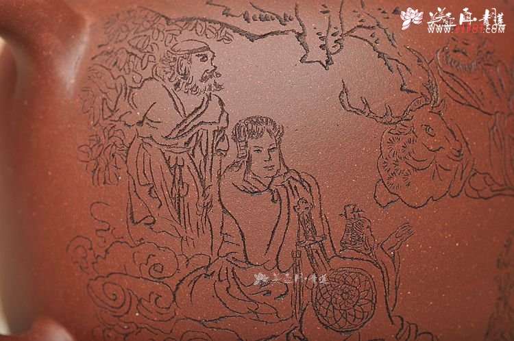 紫砂壶图片：造型简洁大方  刻绘生动逼真  全手明泉  - 宜兴紫砂壶网