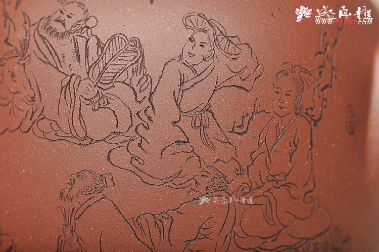 紫砂壶图片：造型简洁大方  刻绘生动逼真  全手明泉  - 宜兴紫砂壶网