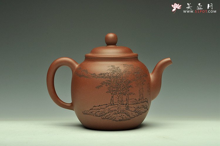 紫砂壶图片：造型简洁大方  刻绘生动逼真  全手明泉  - 宜兴紫砂壶网