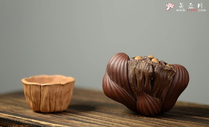 紫砂壶图片：美壶特惠 文雅茶宠 全手工精制  经典莲蓬 - 宜兴紫砂壶网