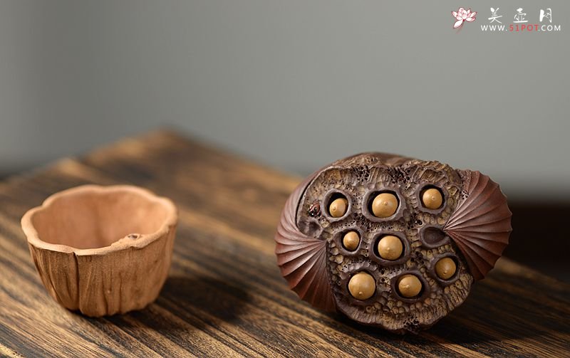 紫砂壶图片：美壶特惠 文雅茶宠 全手工精制  经典莲蓬 - 宜兴紫砂壶网