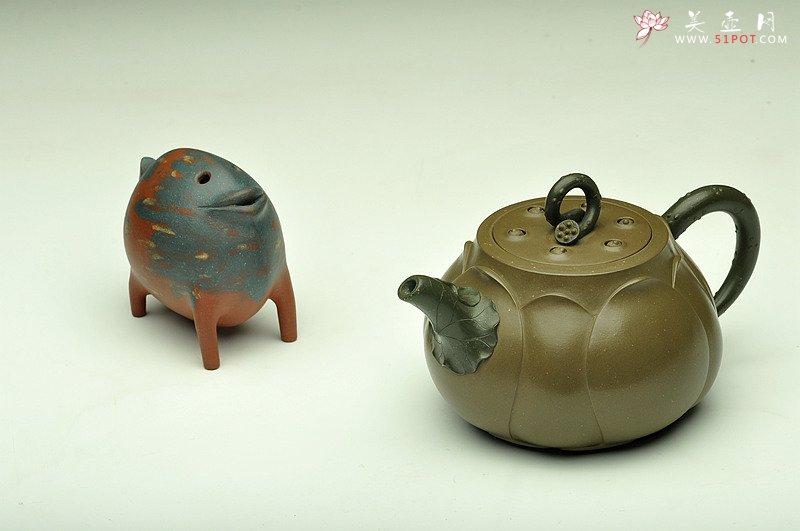 紫砂壶图片：原创作品孙伟强张新亚合作 灵秀俊美    典雅大气 - 宜兴紫砂壶网