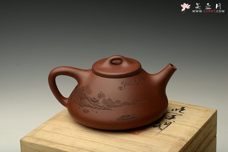 紫砂壶图片：通景山水之子冶石瓢 且品一壶山水 - 宜兴紫砂壶网