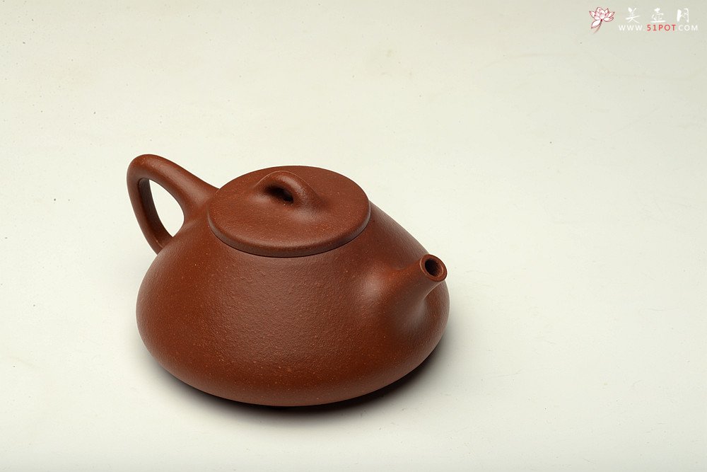 紫砂壶图片：纯料降坡泥 骨肉均挺 全手小子冶石瓢 - 宜兴紫砂壶网