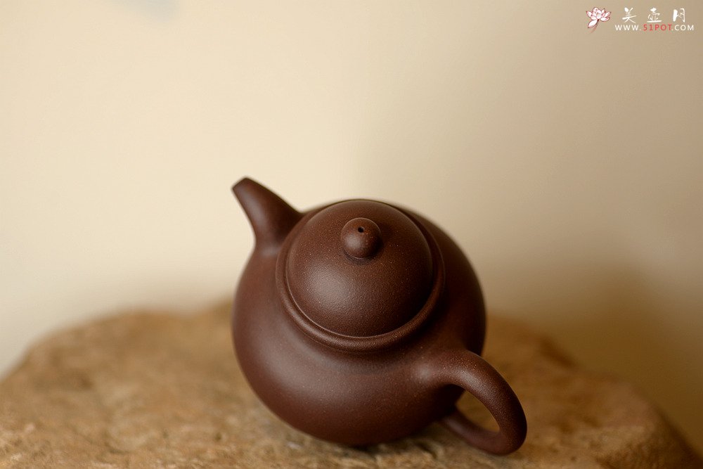 紫砂壶图片：经典再现 全手寿珍掇球 传统实用 - 宜兴紫砂壶网