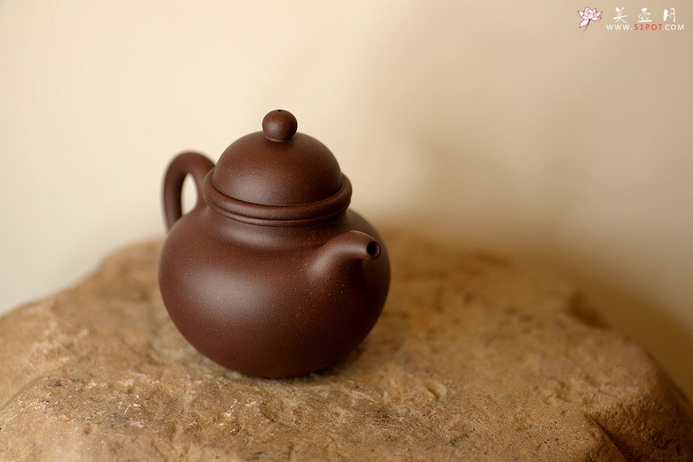 紫砂壶图片：经典再现 全手寿珍掇球 传统实用 - 宜兴紫砂壶网