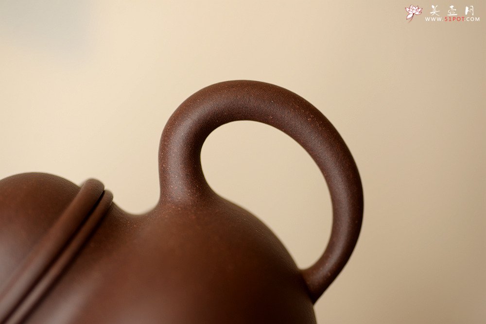 紫砂壶图片：经典再现 全手寿珍掇球 传统实用 - 宜兴紫砂壶网