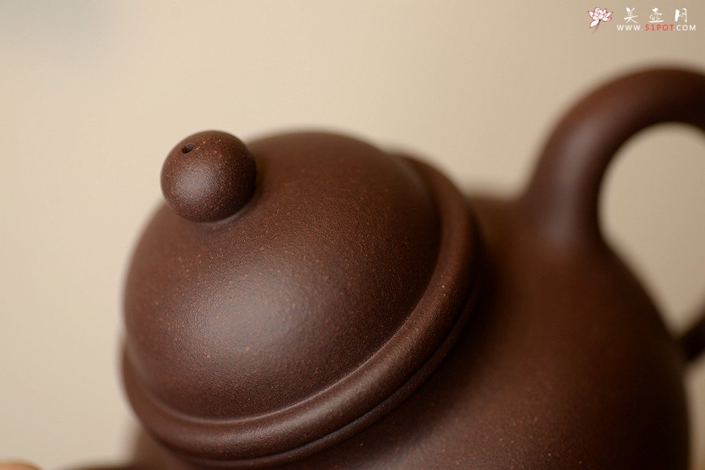 紫砂壶图片：经典再现 全手寿珍掇球 传统实用 - 宜兴紫砂壶网